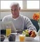 Photo of man eating breakfast