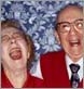 Photo of two older people sharing a laugh