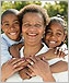 photo of a woman with two young children